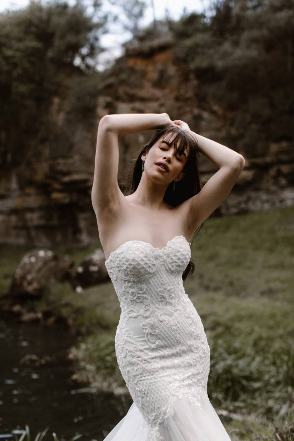 Organic lace trims this sweetheart strapless fishtail & is used throughout the bodice while small beaded florals give this wedding dress an artful look.