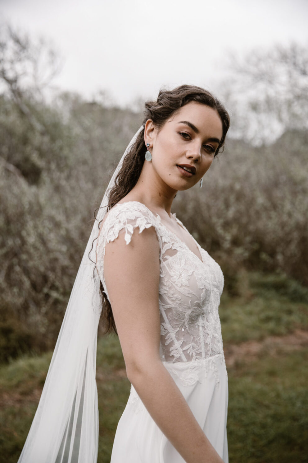 Our Jiana veil is everything you need on your wedding day, floral lace graces this 2.75M tulle veil and adds a touch of elegance as you walk down the aisle.
