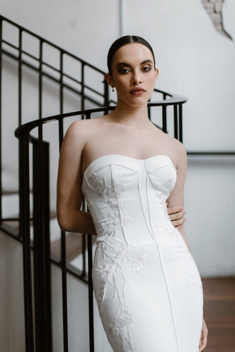 This strapless gown is timelss in its simplicity but shines with an intraciy in its details creating a elegant masterpiece of construction. strapless gown is timelss in its simplicity but shines with an intraciy in its details creating a elegant masterpiece of construction.