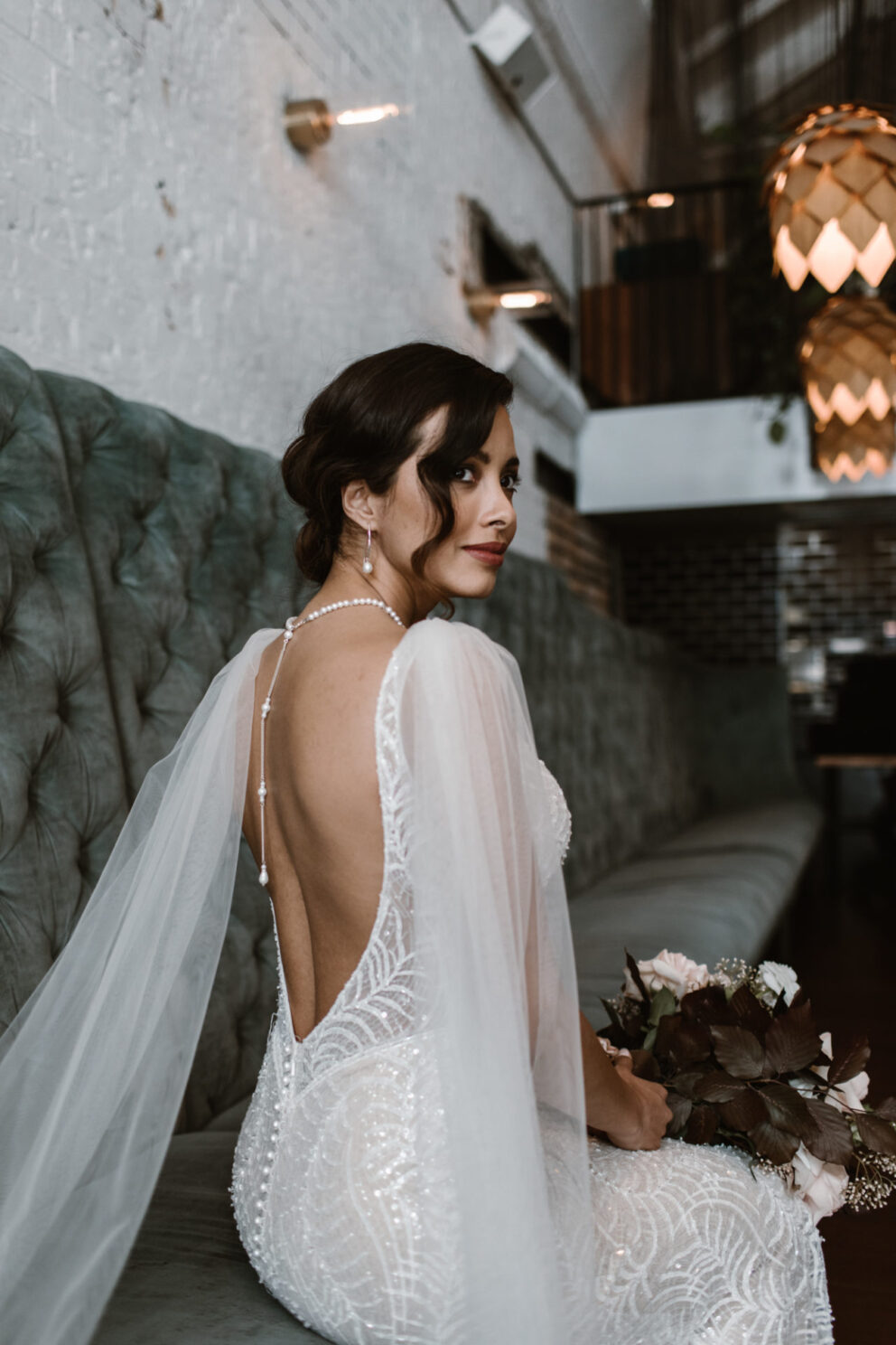 With a plunging neckline and sexy open back, our Jamieson gown hugs your figure perfectly and gently shimmers with your every move. a plunging neckline and sexy open back, our Jamieson gown hugs your figure perfectly and gently shimmers with your every move