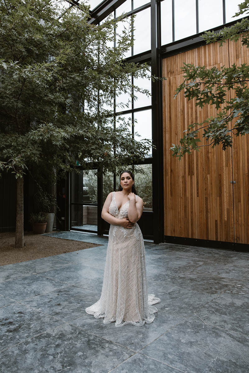 A flattering V-neck & A-line shaped skirt are perfectly complimented by a textured vintage inspired lace that opens up to a chapel train fit for a princess