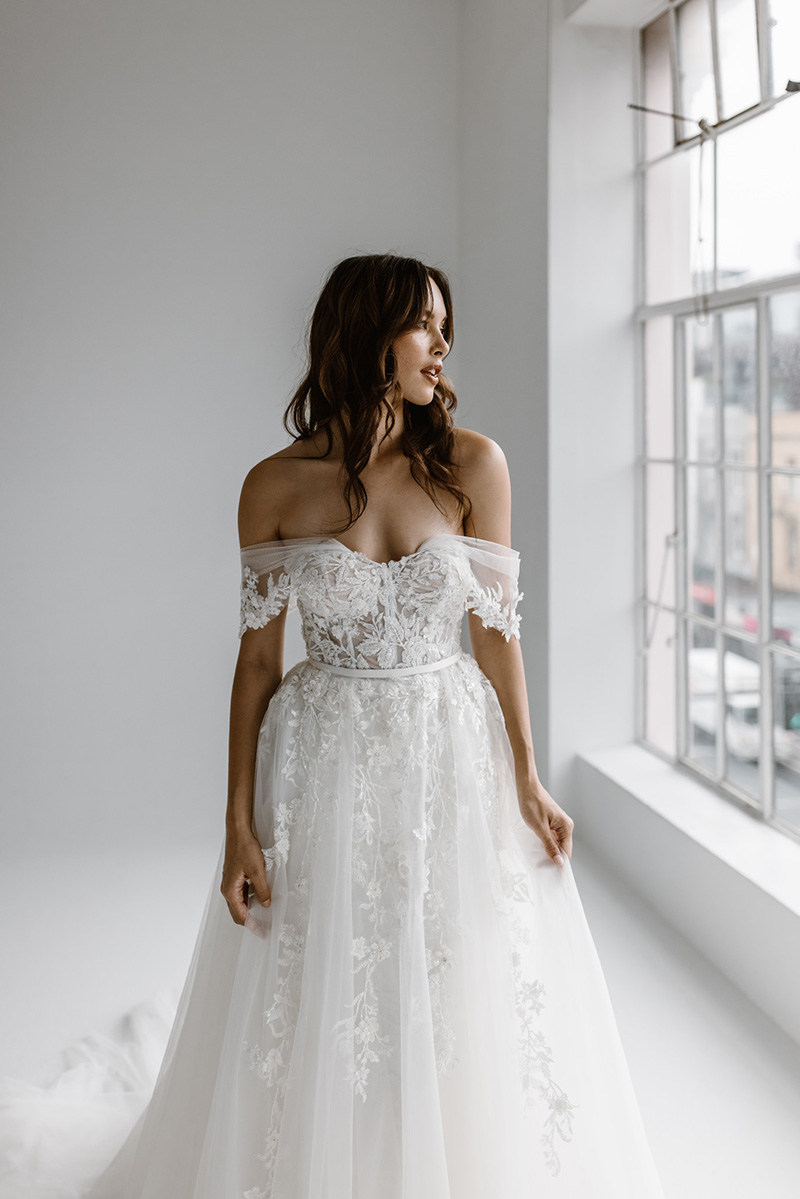  The Rebel over skirt is a classic tulle princess silhouette. Creating a flirty and fun addition that can be used to enhance our Rebel gown or used as part of a two piece wedding dress offering brides the versatility of designing their own look.